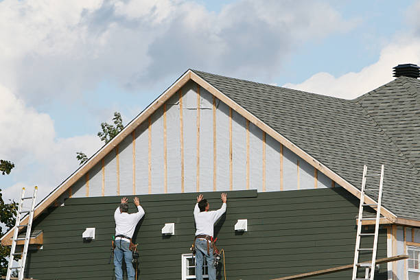 Professional Siding Replacement technician working in Dresden, OH